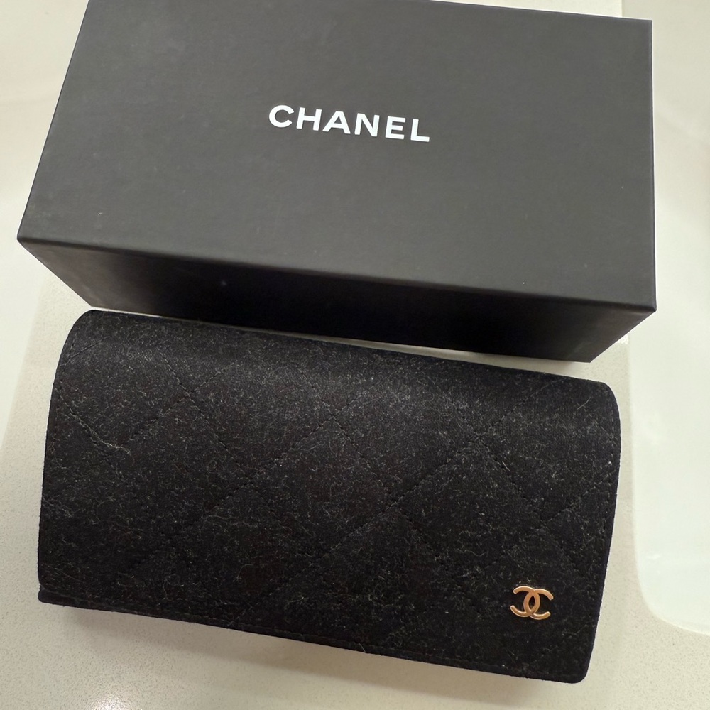 CHANEL Black Quilted Clutch with Gold Accent